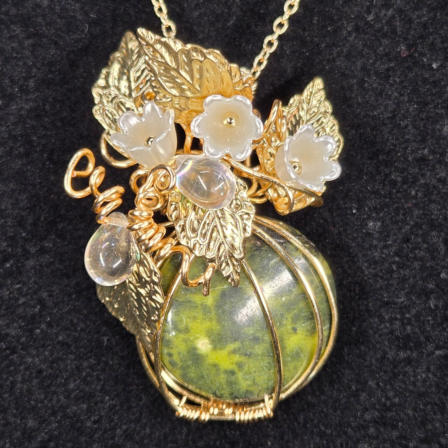 Serpentine Stone Pendant with Gold Leaves and Crystal Flowers