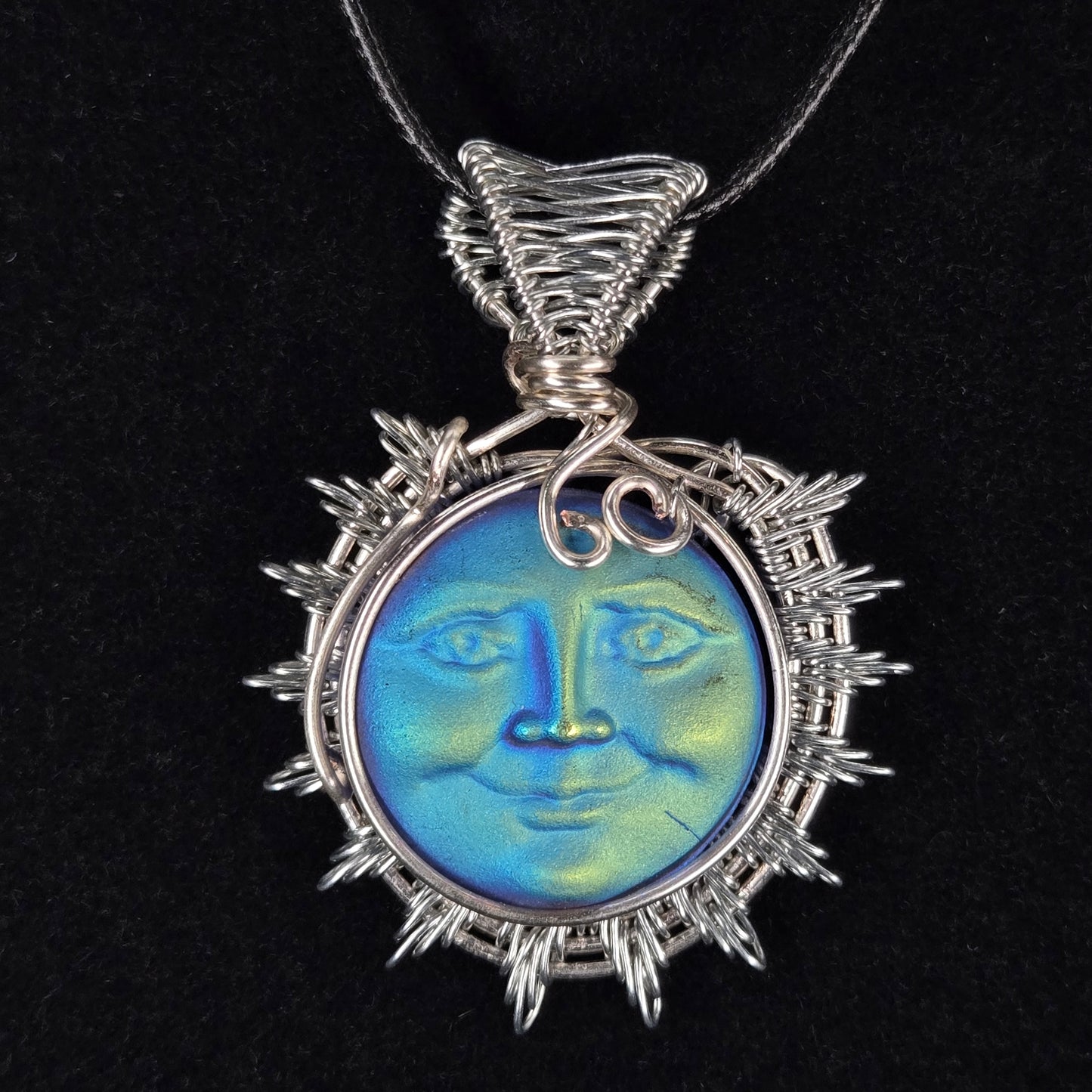 Blue Moon Face Pendant with Silver Wire Sunburst Design