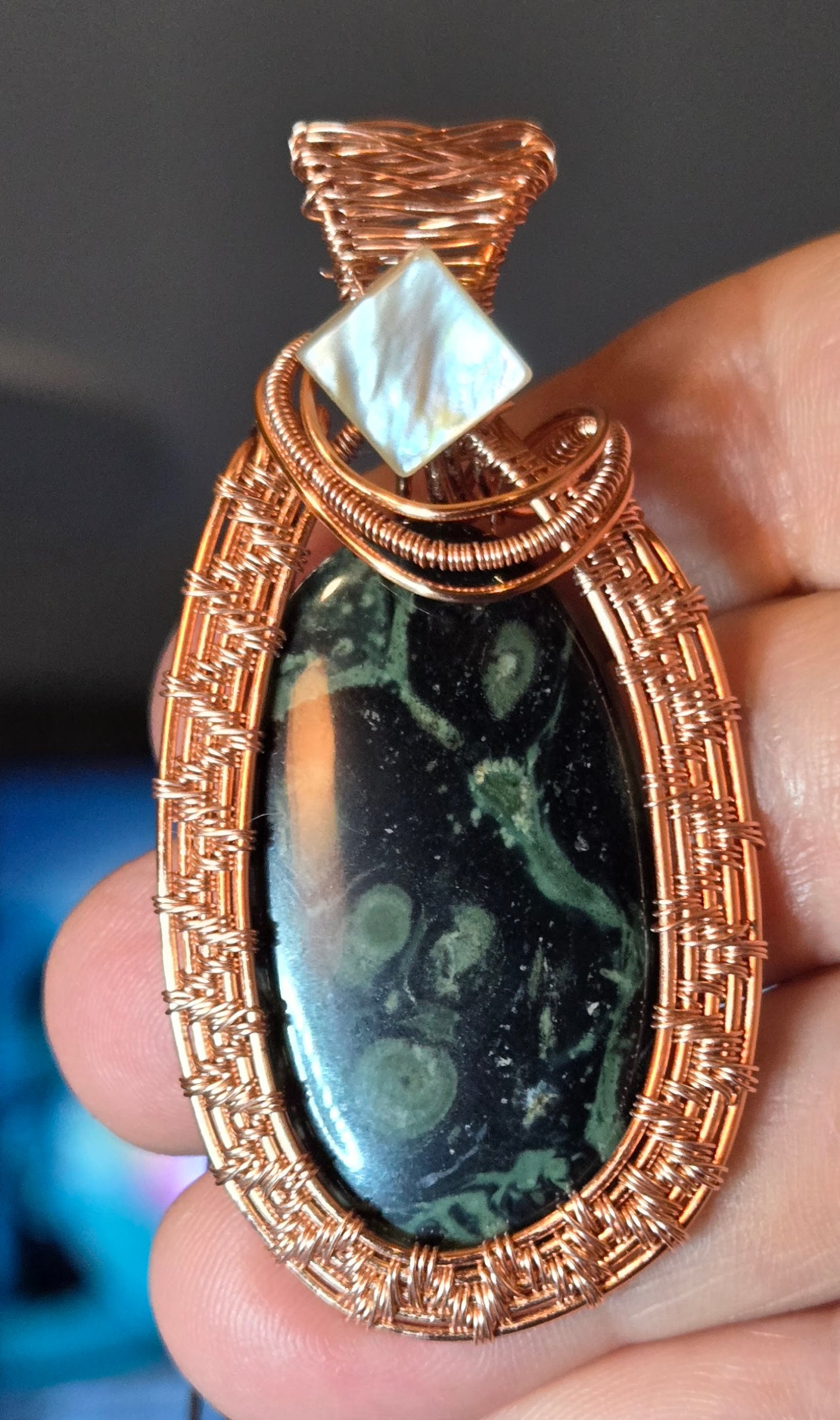 "Obsidian Bloom" – Handcrafted Copper Wire-Wrapped Kambaba Jasper & Mother of Pearl Pendant