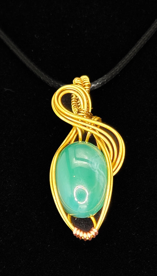"Emerald Twist" – Glass Cabochon Wrapped Pendant