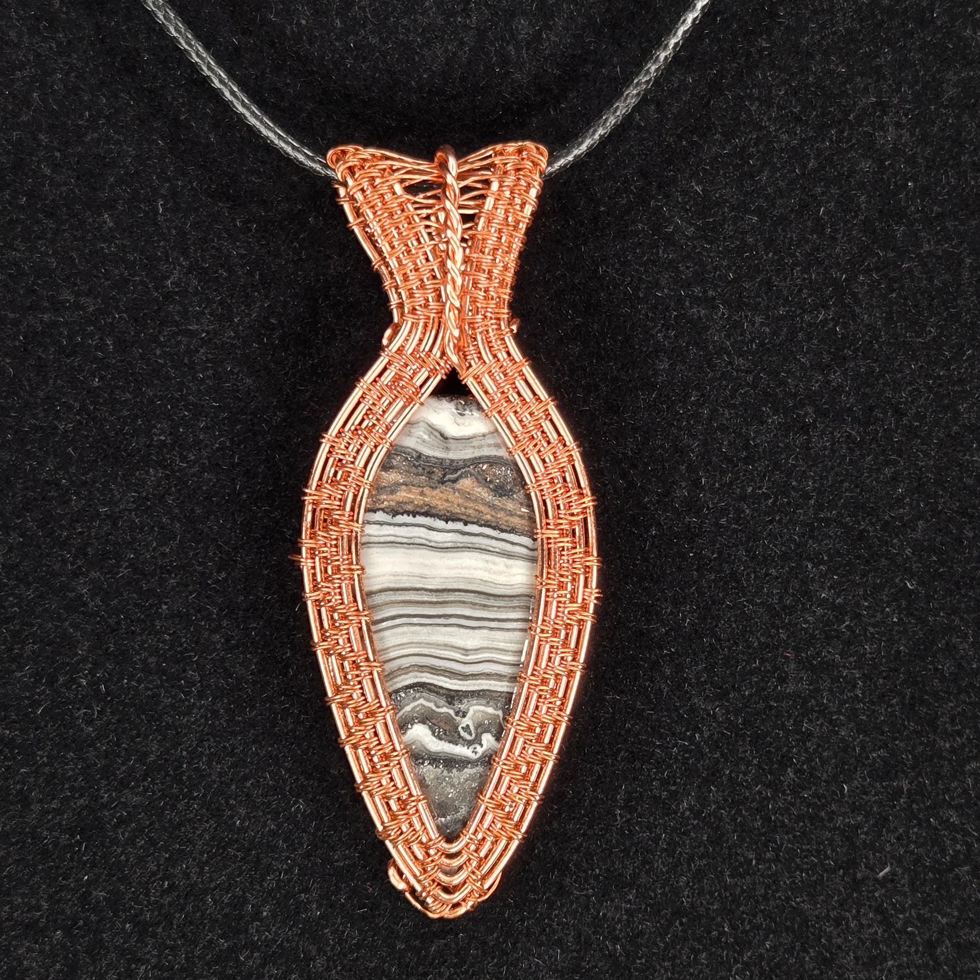 Phantom Calcite Pendant with Intricate Copper Wire Weave