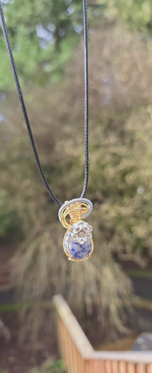 Possible - Sterling Silver wrapped Sodalite Pendant .
